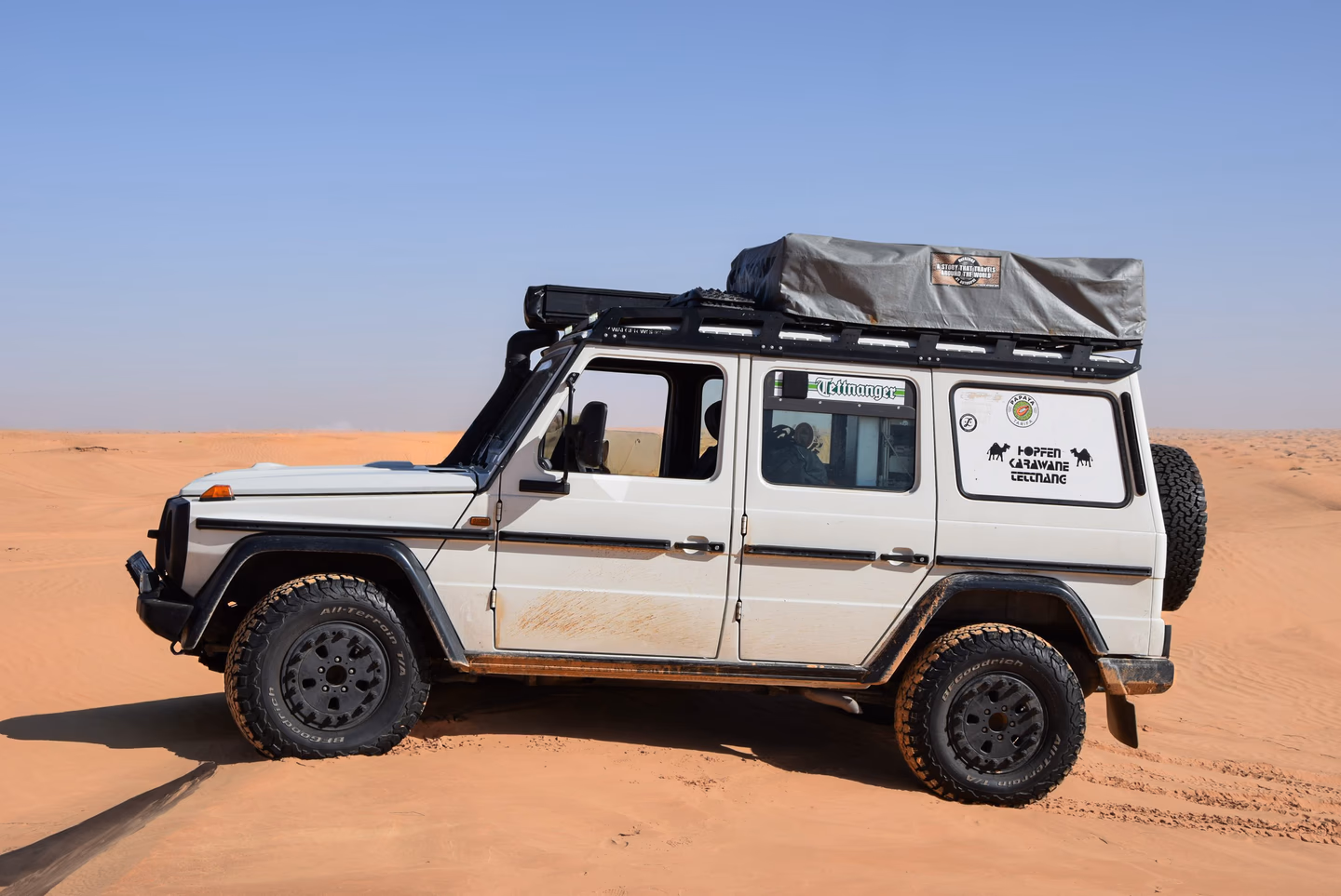 Mercedes G-Class with Walger Works roof rack — side view, desert